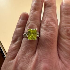 Lia Sophia rhodium finish ring with a pale green crystal